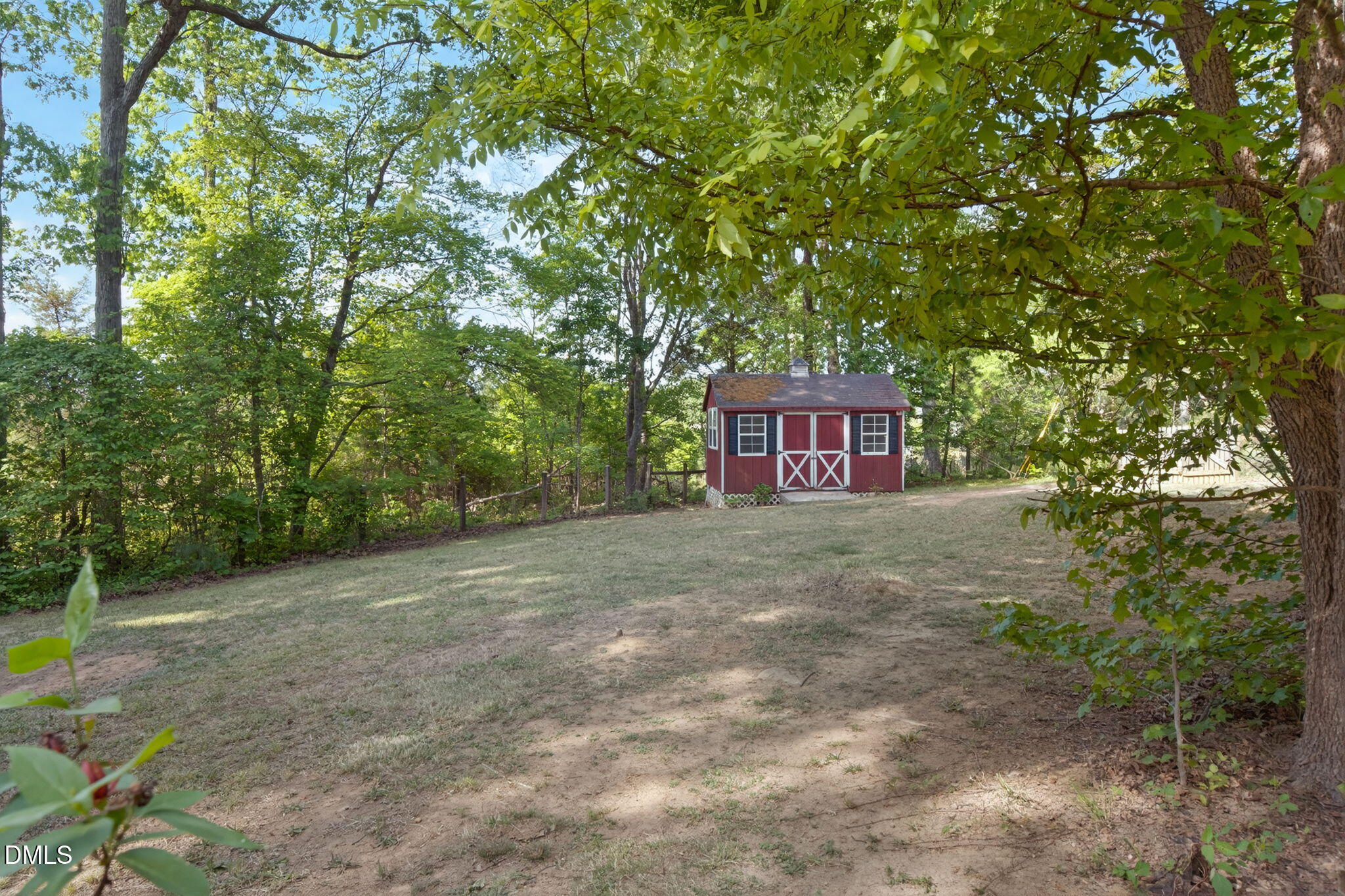 1714 Terry Road Durham, NC 27712 - Photo 4 of 39 a view of a house with a tree