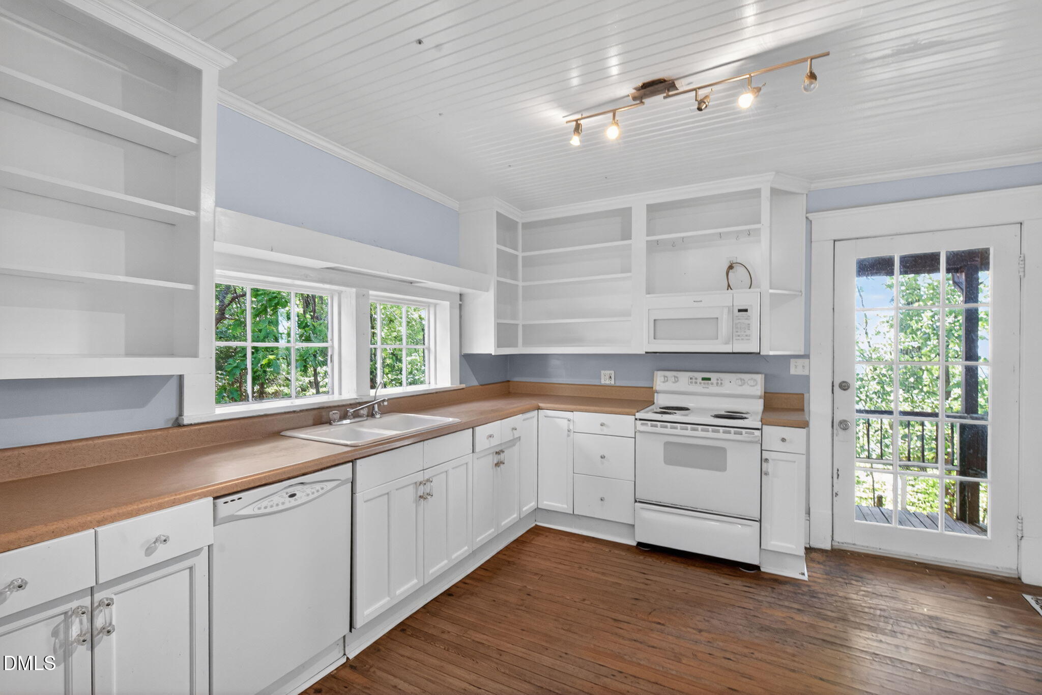 1714 Terry Road Durham, NC 27712 - Photo 8 of 39 a kitchen with a sink window and cabinets