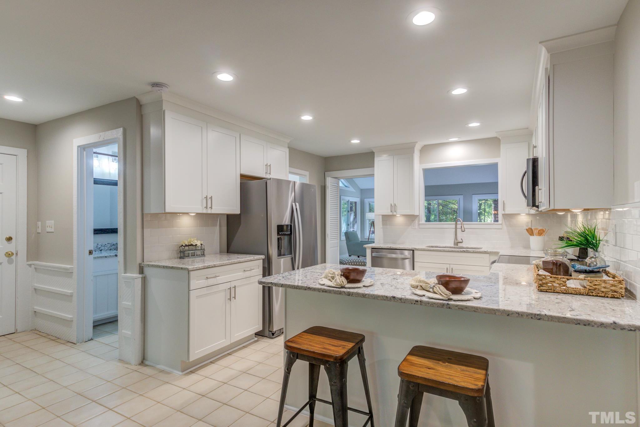 New cabinets, new granite, new fixtures and new appliance package