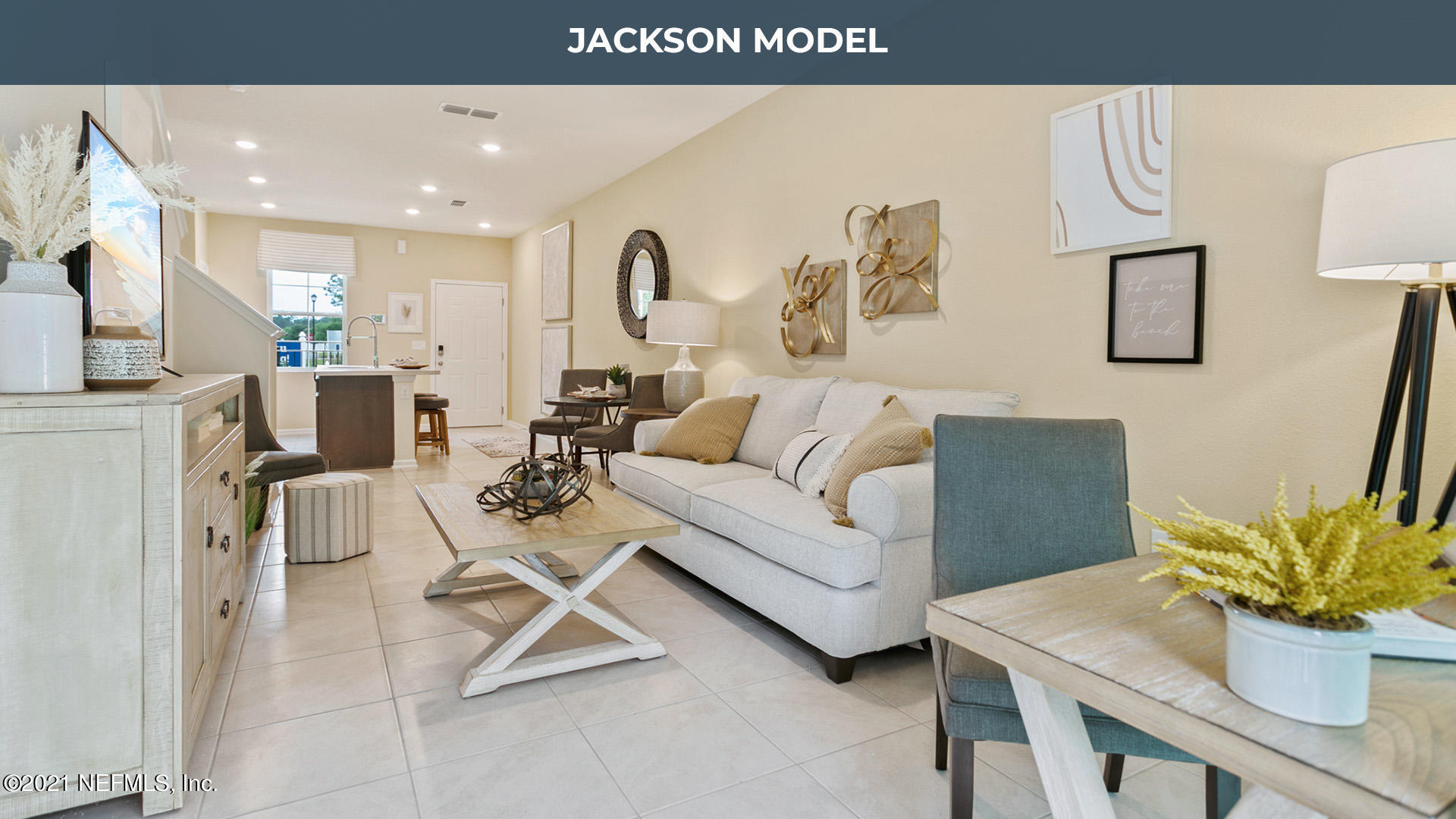 575 Oakleaf Plantation Parkway, Unit 208 Orange Park, FL 32065 - Photo 6 of 22 a living room with furniture and a potted plant