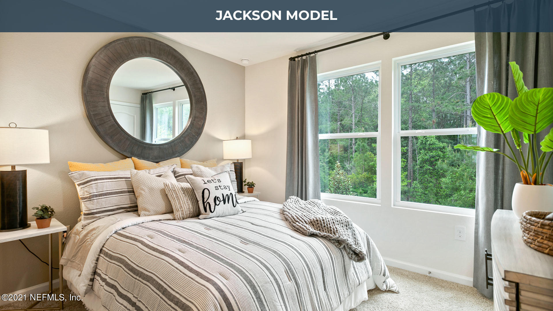 575 Oakleaf Plantation Parkway, Unit 208 Orange Park, FL 32065 - Photo 7 of 22 a bedroom with bed and a large window