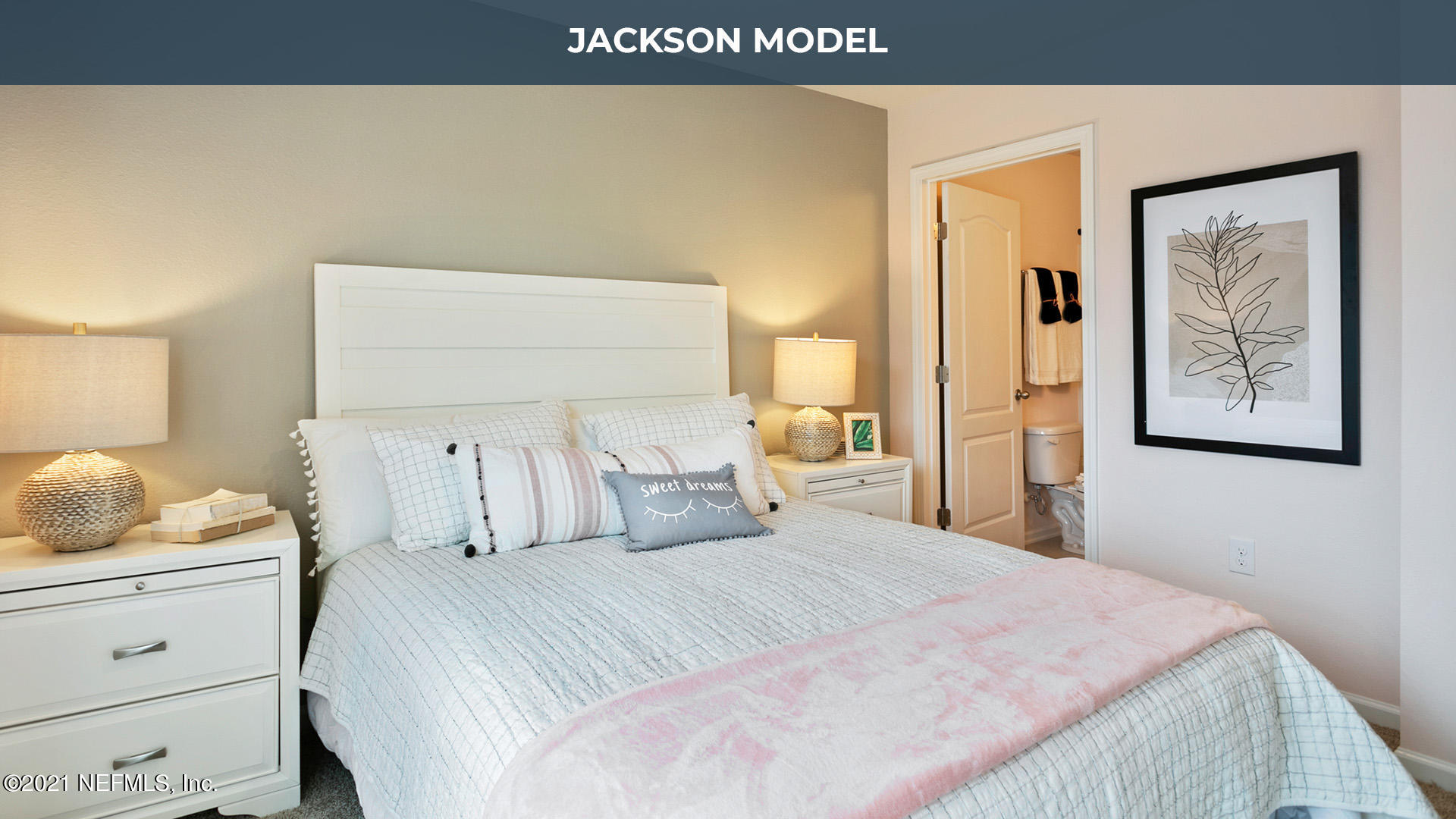 575 Oakleaf Plantation Parkway, Unit 208 Orange Park, FL 32065 - Photo 9 of 22 a bedroom with a bed and painting on the wall