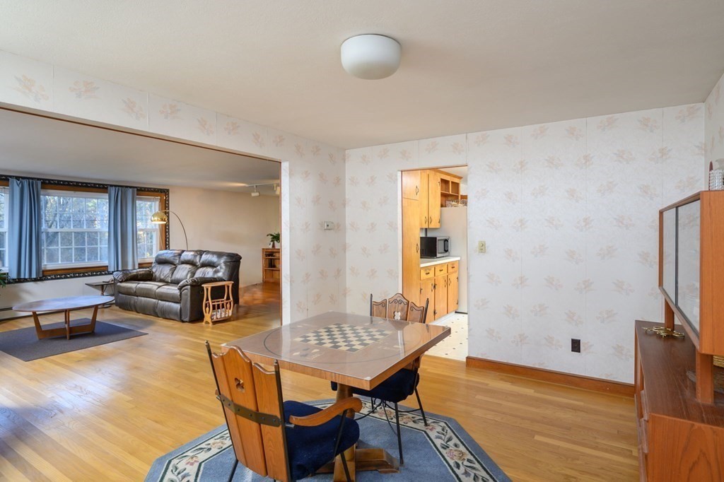 1 Pine Grove Road Hingham, MA 02043 - Photo 15 of 22 a living room with furniture and wooden floor
