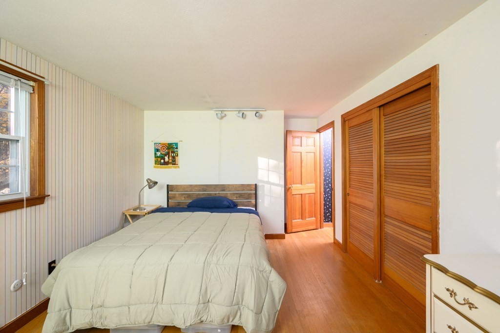 1 Pine Grove Road Hingham, MA 02043 - Photo 18 of 22 a bedroom with a bed and a window