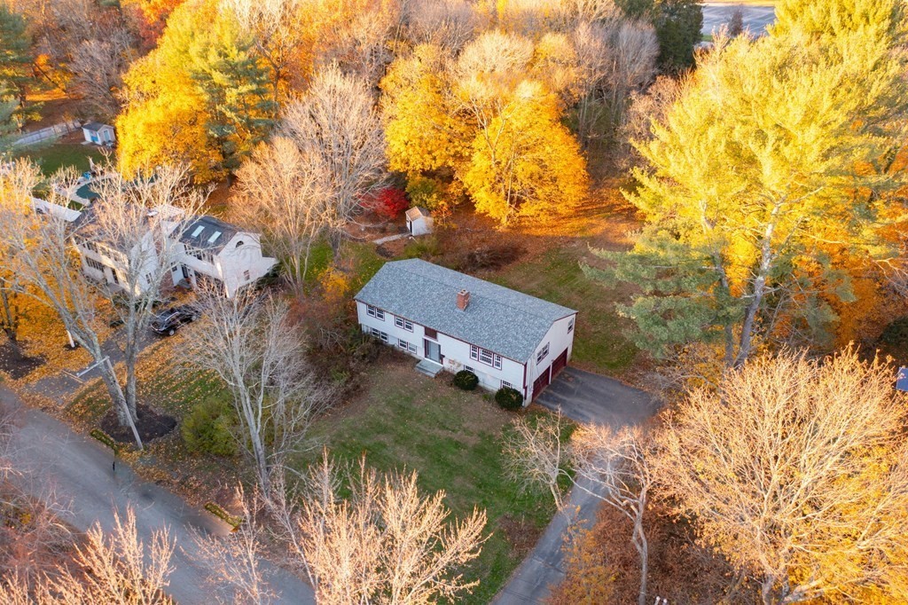 1 Pine Grove Road Hingham, MA 02043 - Photo 2 of 22 a backyard of a house with lots of green space