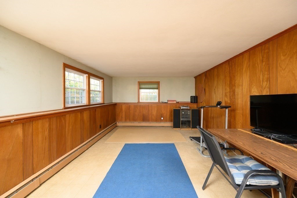 1 Pine Grove Road Hingham, MA 02043 - Photo 22 of 22 a view of a living room with a flat screen tv
