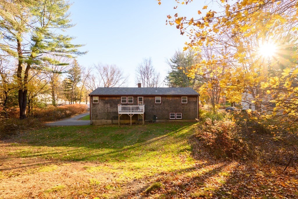 1 Pine Grove Road Hingham, MA 02043 - Photo 6 of 22 a view of a house with a yard