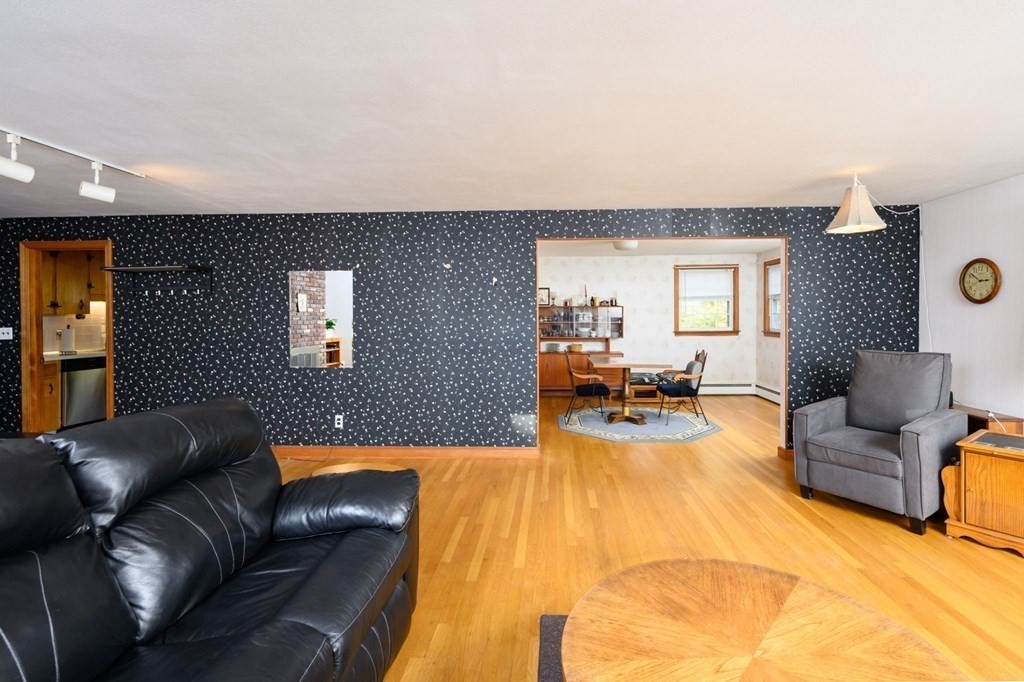 1 Pine Grove Road Hingham, MA 02043 - Photo 7 of 22 a living room with furniture and a flat screen tv