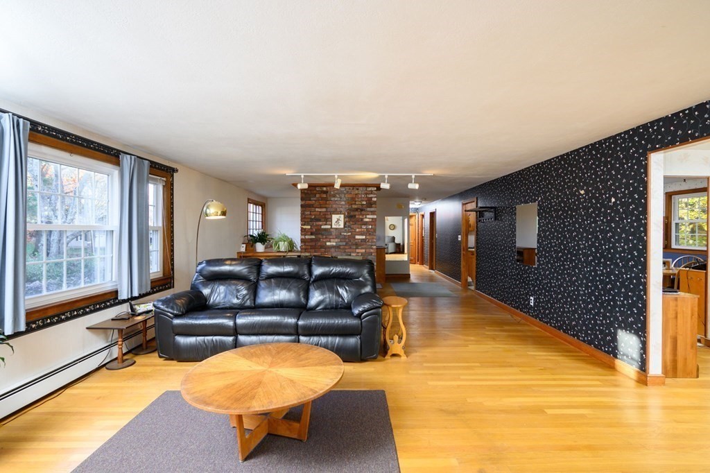 1 Pine Grove Road Hingham, MA 02043 - Photo 8 of 22 a living room with furniture pool table and a flat screen tv