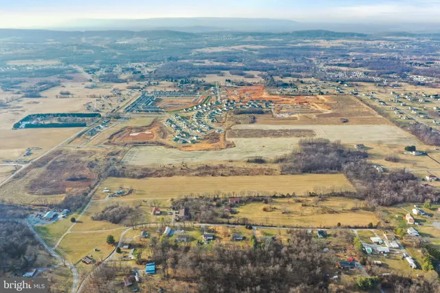 a view of swimming pool with a yard