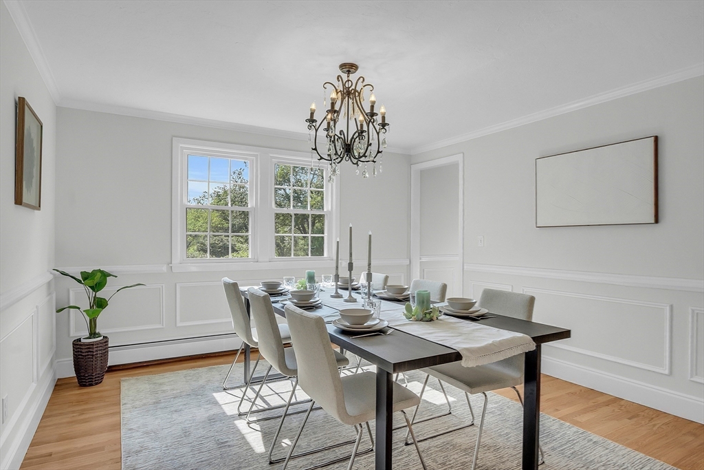 36 Flint Road Acton, MA 01720 - Photo 11 of 37 a view of a dining room with furniture window and wooden floor