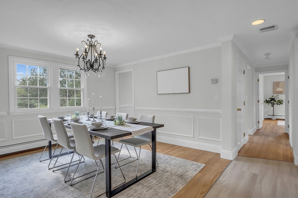 36 Flint Road Acton, MA 01720 - Photo 13 of 37 a view of a dining room with furniture window and wooden floor