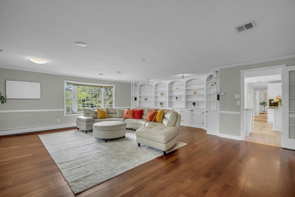 36 Flint Road Acton, MA 01720 - Photo 16 of 37 a living room with furniture and wooden floor
