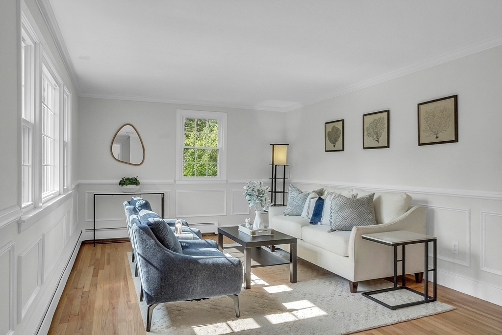 36 Flint Road Acton, MA 01720 - Photo 17 of 37 a living room with furniture a rug and a window