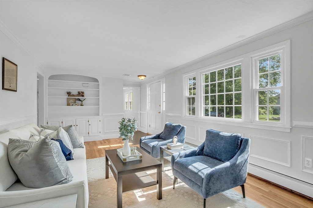 36 Flint Road Acton, MA 01720 - Photo 19 of 37 a living room with furniture and a large window