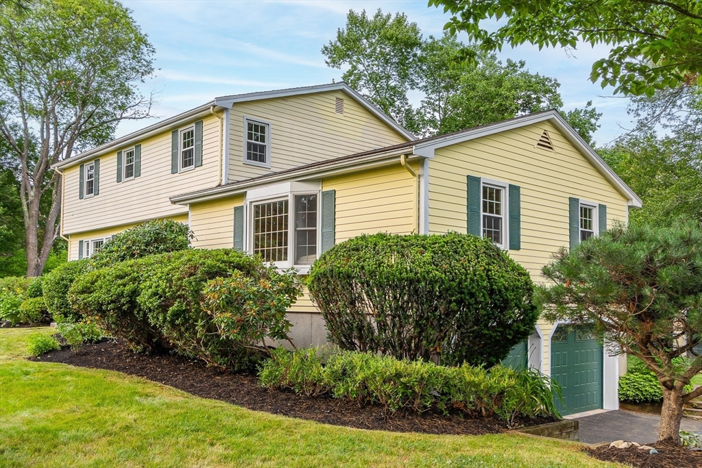 36 Flint Road Acton, MA 01720 - Photo 2 of 37 a house that has a lot of plants in it