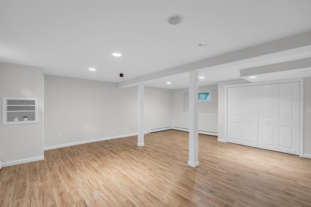 36 Flint Road Acton, MA 01720 - Photo 30 of 37 a view of an empty room with wooden floor