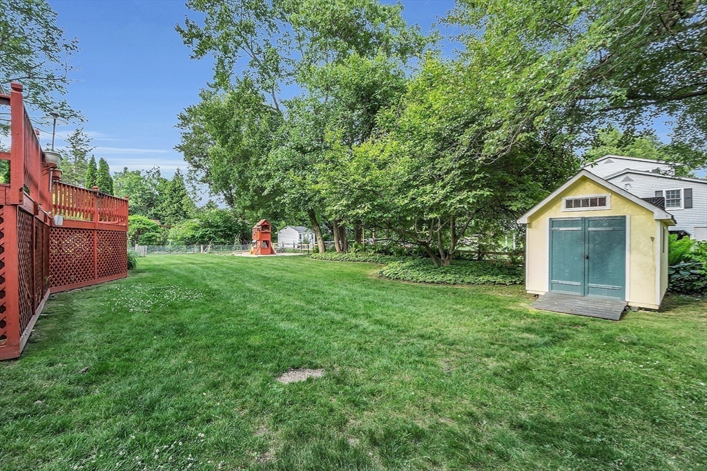36 Flint Road Acton, MA 01720 - Photo 33 of 37 a view of an house with backyard space and garden