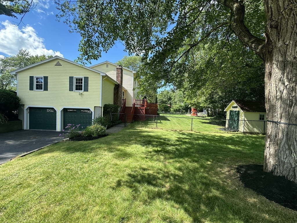 36 Flint Road Acton, MA 01720 - Photo 37 of 37 a view of a house with a yard