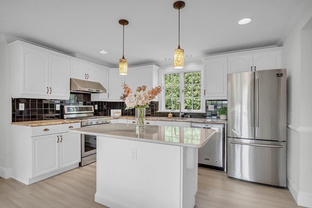36 Flint Road Acton, MA 01720 - Photo 7 of 37 a kitchen with refrigerator and window