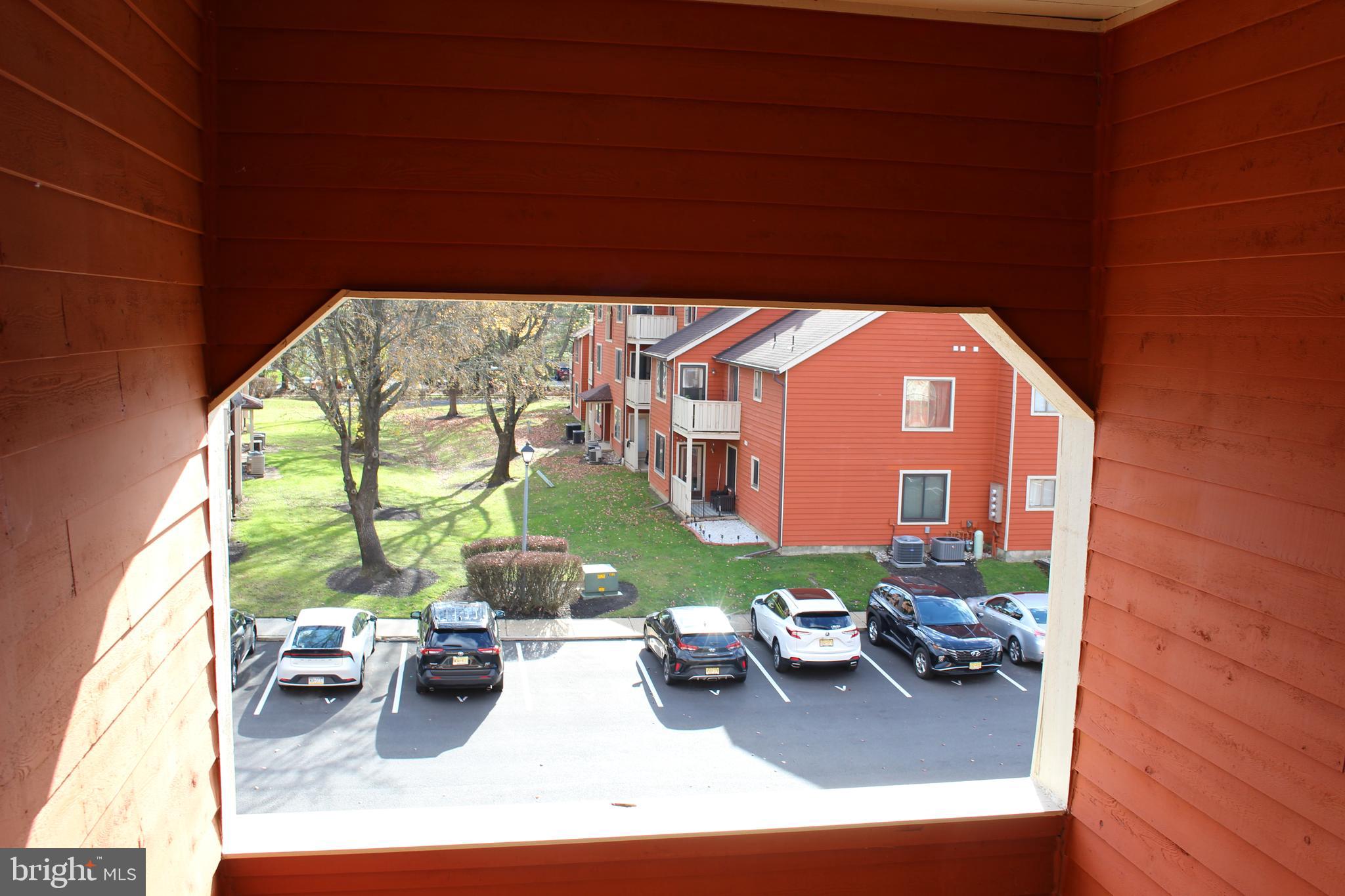 2614 C Auburn Court Mount Laurel, NJ 08054 - Photo 14 of 26 a view of yard from deck with patio