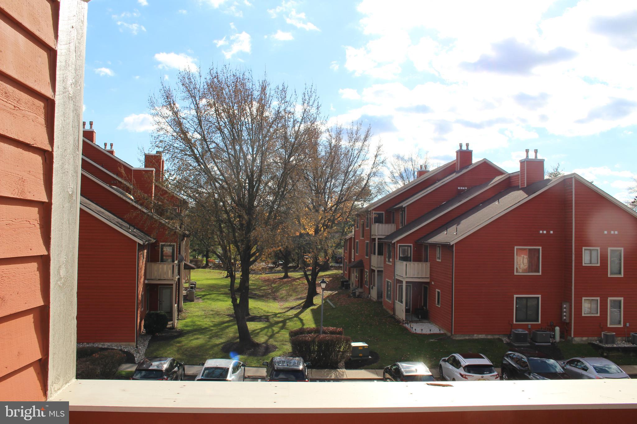 2614 C Auburn Court Mount Laurel, NJ 08054 - Photo 15 of 26 a view of a house with a yard