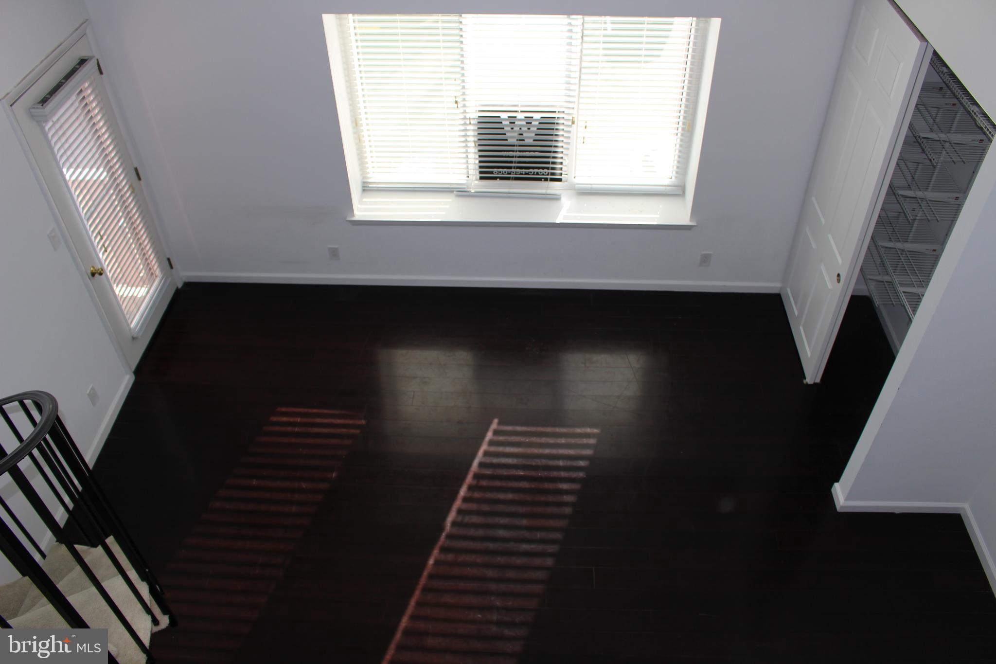 2614 C Auburn Court Mount Laurel, NJ 08054 - Photo 23 of 26 a view of an entryway with wooden floor