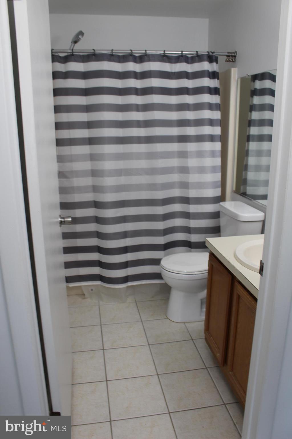 2614 C Auburn Court Mount Laurel, NJ 08054 - Photo 9 of 26 a bathroom with a sink and a toilet