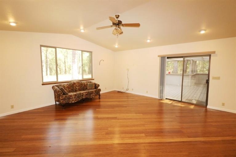 326 April Drive Merlin, OR 97532 - Photo 8 of 27 a living room with furniture and a ceiling fan