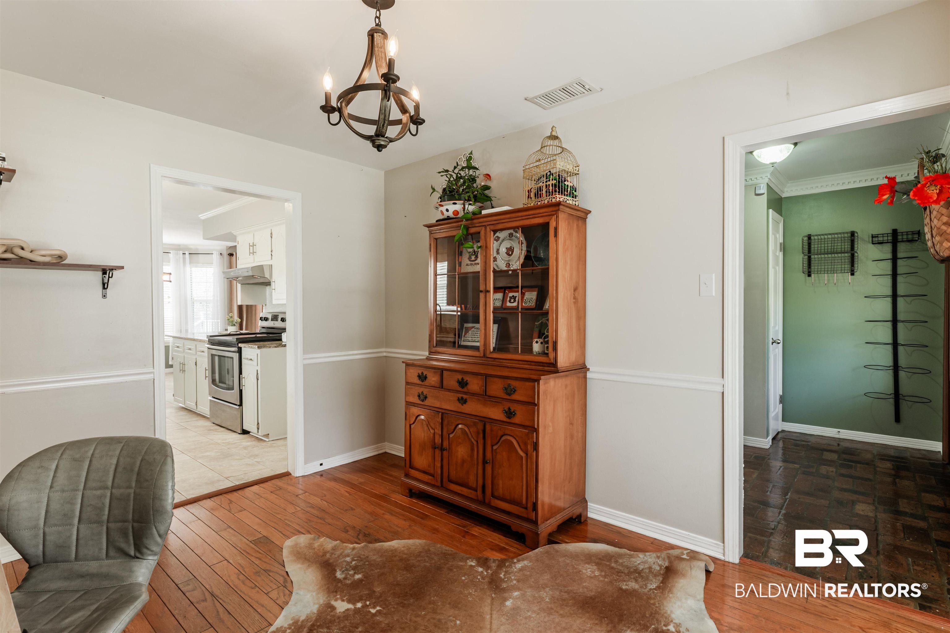 3844 Isabel Way South Mobile, AL 36693 - Photo 8 of 49 Interior space featuring an inviting chandelier and light hardwood / wood-style flooring