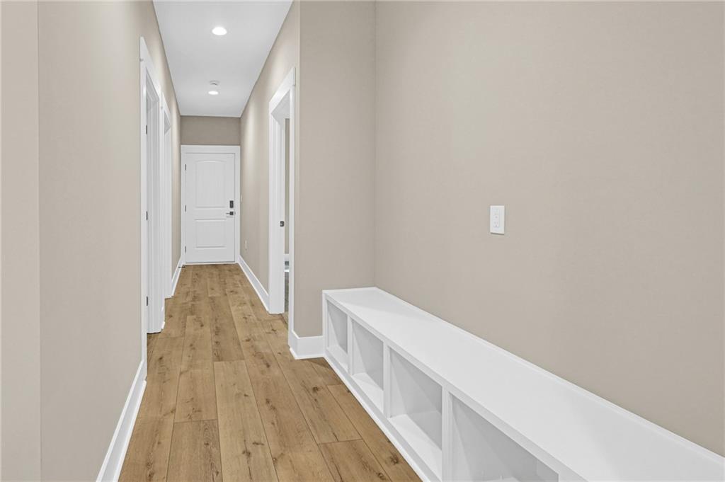 507 North Ridge Road Barnesville, GA 30204 - Photo 6 of 18 a view of a hallway with wooden floor