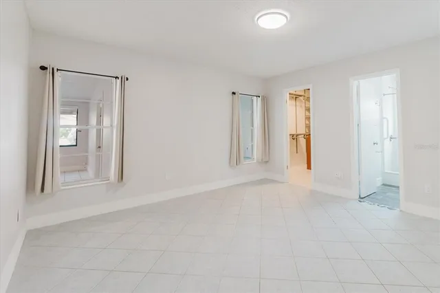 an empty room with a bathroom