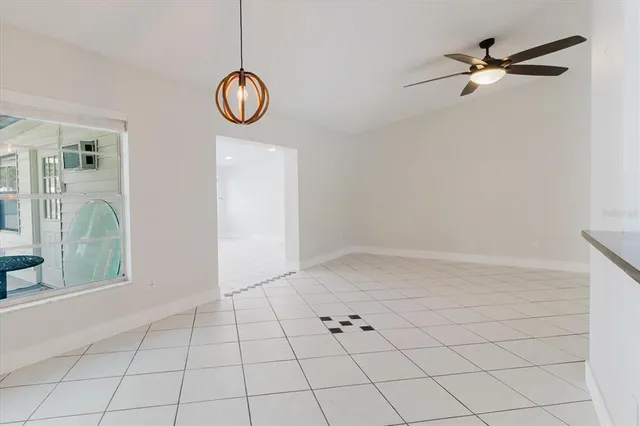 a kitchen with stainless steel appliances a stove a microwave and cabinets