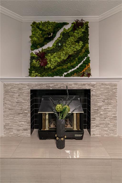 970 Sidney Marcus Boulevard Northeast, Unit 1204 Atlanta, GA 30324 - Photo 30 of 60 a fireplace with a clock on it