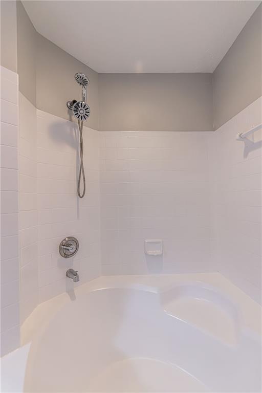 970 Sidney Marcus Boulevard Northeast, Unit 1204 Atlanta, GA 30324 - Photo 45 of 60 a bathroom with a shower