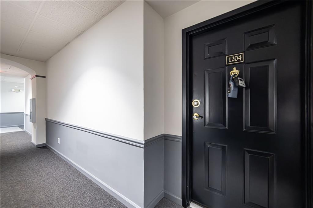 970 Sidney Marcus Boulevard Northeast, Unit 1204 Atlanta, GA 30324 - Photo 48 of 60 a view of a hallway with entryway