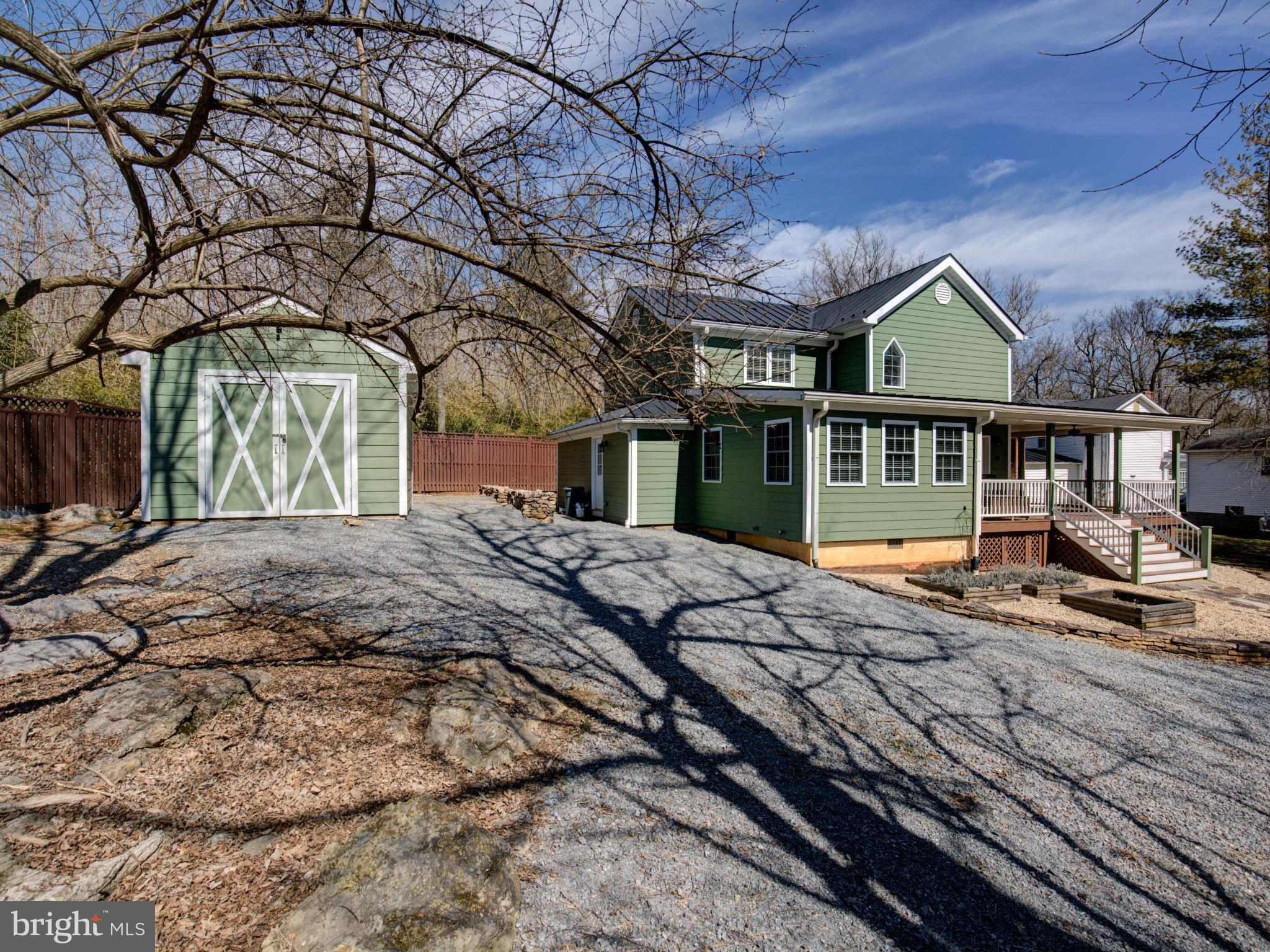 80 Rocky Bank Road Boyce, VA 22620 - Photo 3 of 30 a front view of a house with a yard