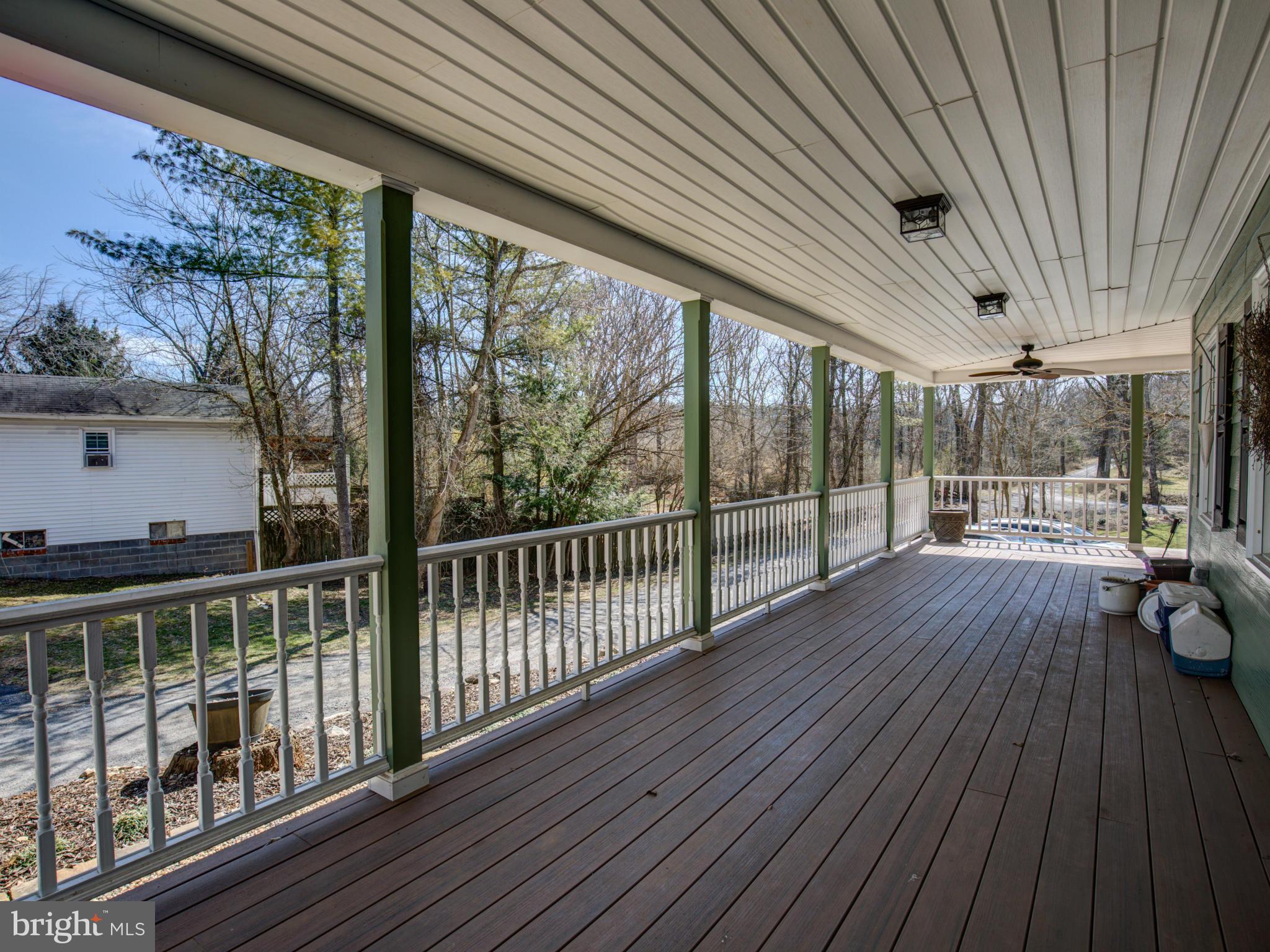 80 Rocky Bank Road Boyce, VA 22620 - Photo 6 of 30 a view of a porch with wooden floor
