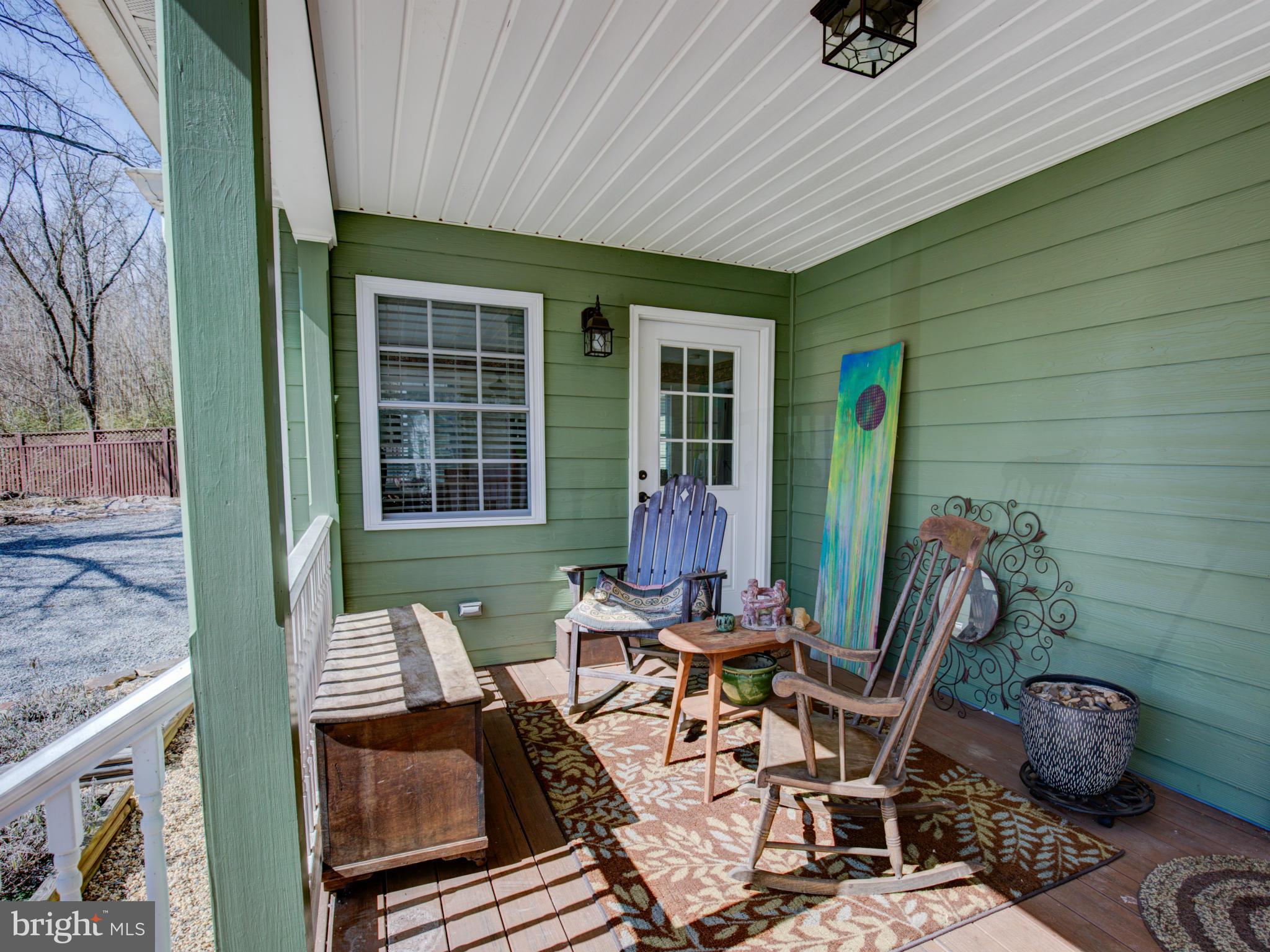 80 Rocky Bank Road Boyce, VA 22620 - Photo 7 of 30 a view of a chairs and table in patio