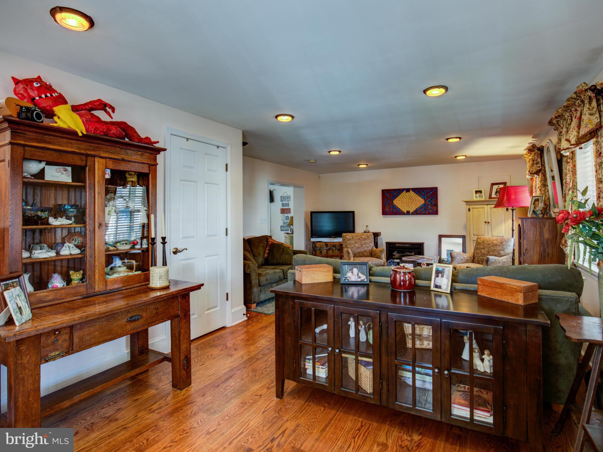 80 Rocky Bank Road Boyce, VA 22620 - Photo 10 of 30 a living room with furniture and a wooden floor