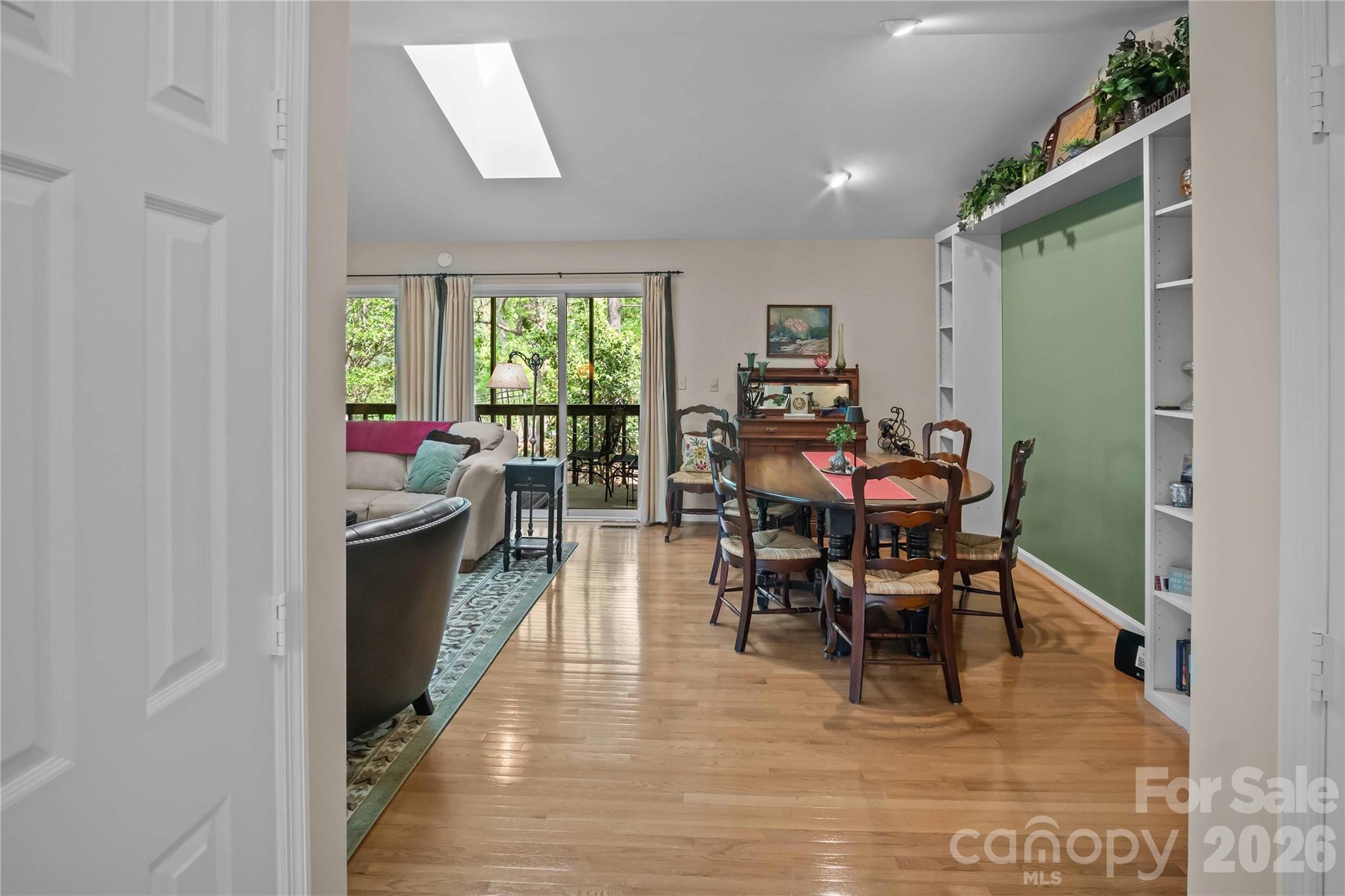 335 Melrose Avenue, Unit 103 Tryon, NC 28782 - Photo 16 of 38 a view of a dining room with furniture window and outside view