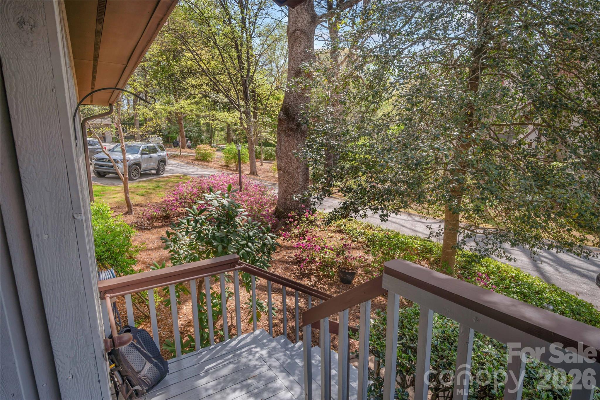335 Melrose Avenue, Unit 103 Tryon, NC 28782 - Photo 33 of 38 a view of a balcony with a pot