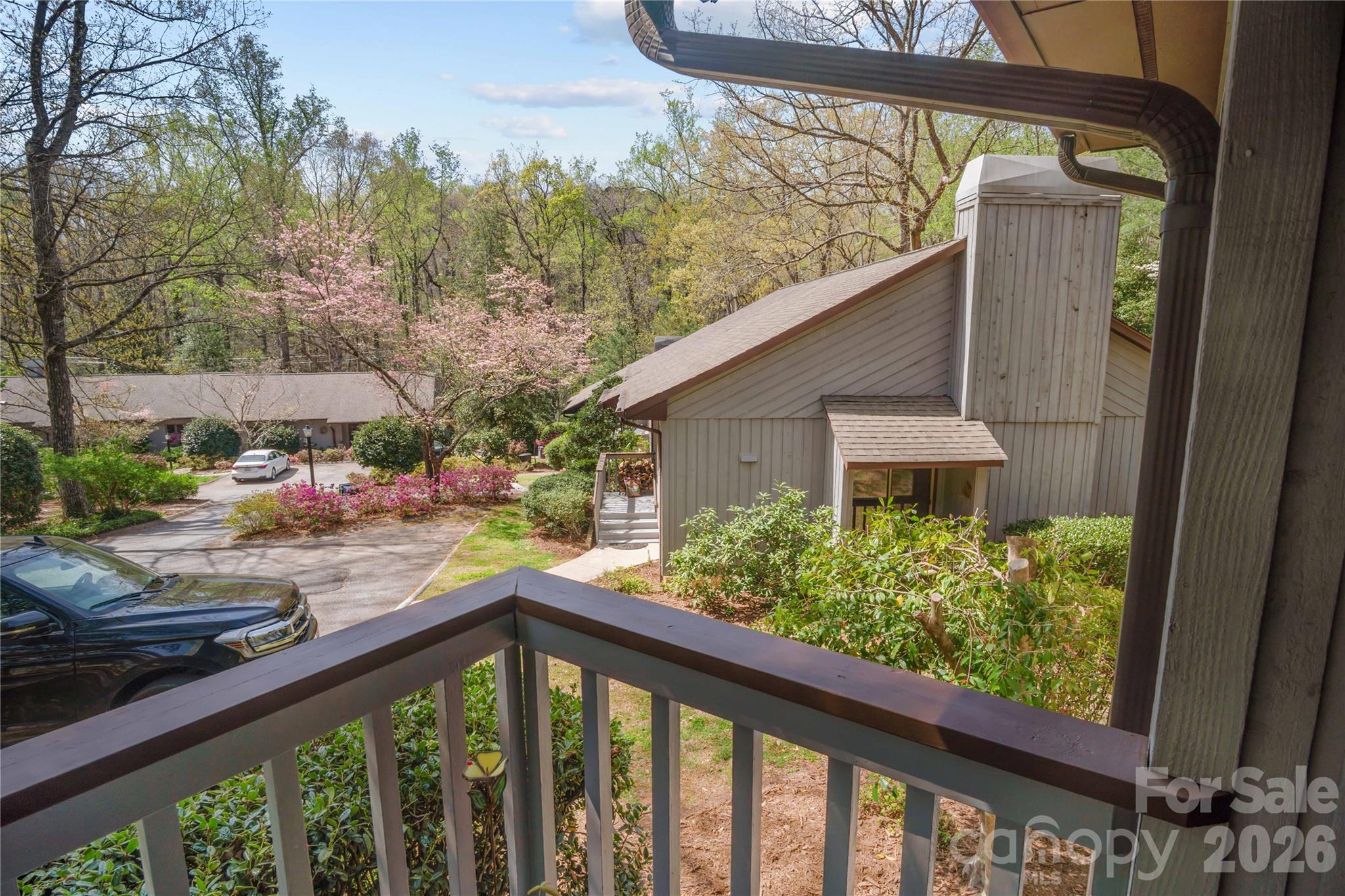 335 Melrose Avenue, Unit 103 Tryon, NC 28782 - Photo 34 of 38 a view of a porch with a yard