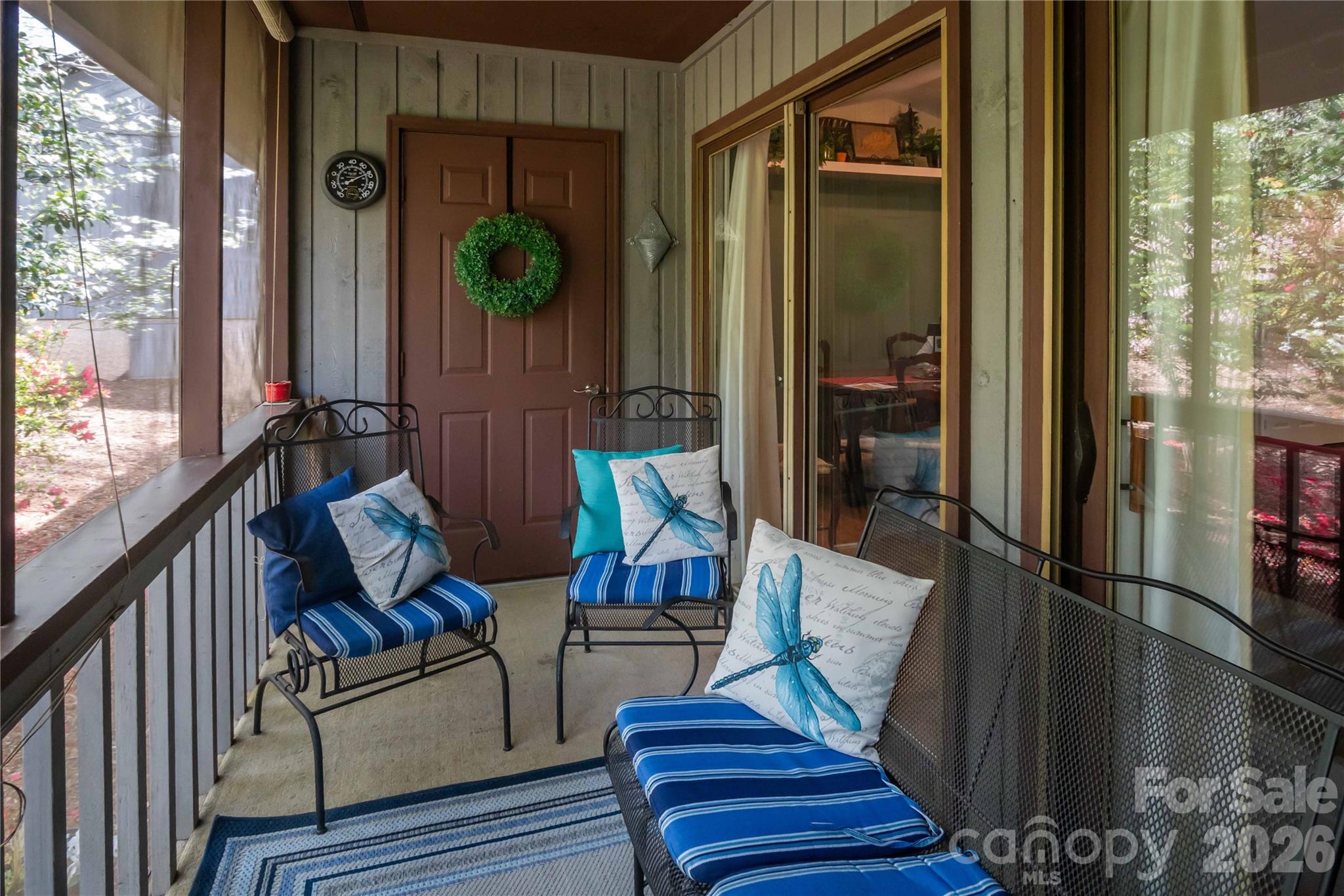 335 Melrose Avenue, Unit 103 Tryon, NC 28782 - Photo 38 of 38 a living room with furniture and a potted plant