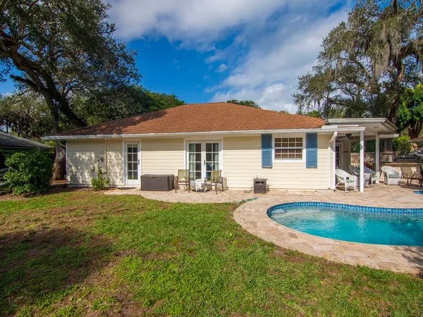a view of a house with swimming pool