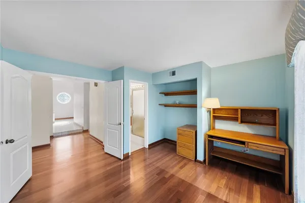 a view of livingroom with furniture and wooden floor