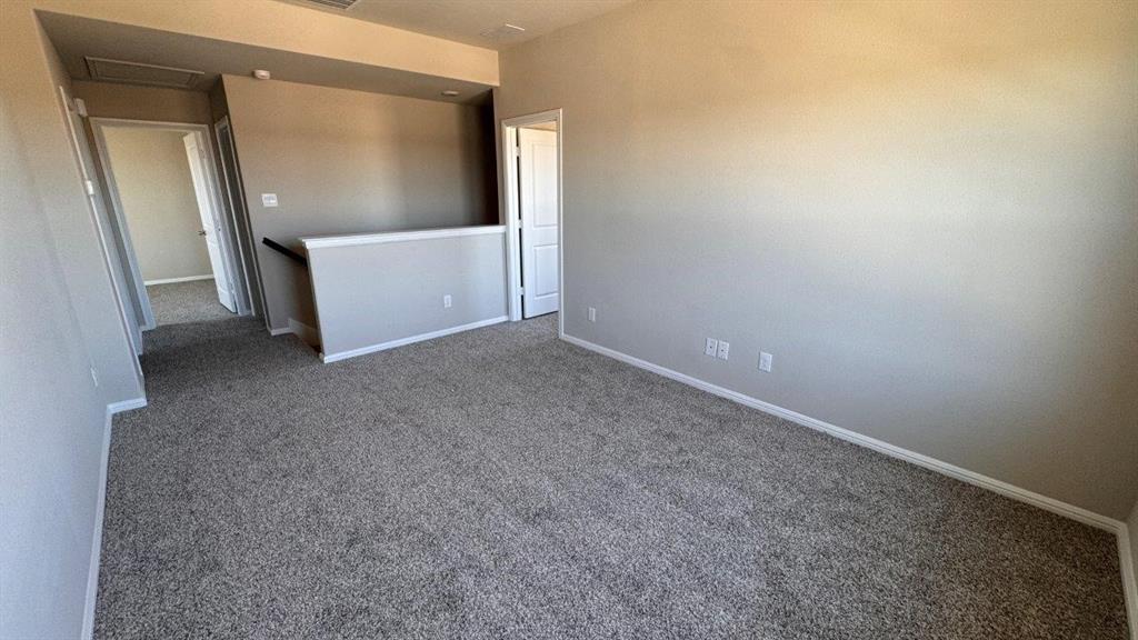 325 Wildrose Circle Cleburne, TX 76033 - Photo 14 of 24 a view of an empty room