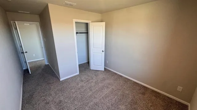 a bathroom with a sink toilet and vanity