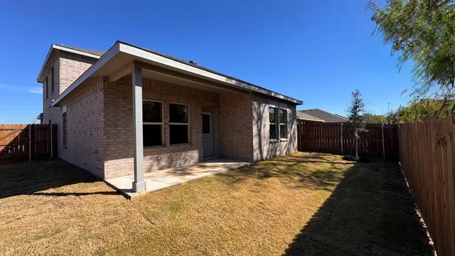 a view of outdoor space with a swimming pool