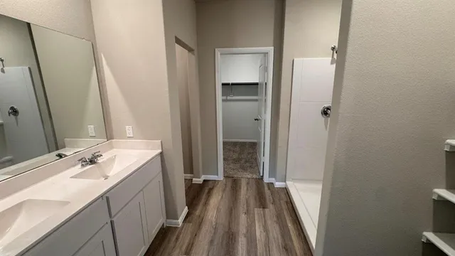an empty room with closet area